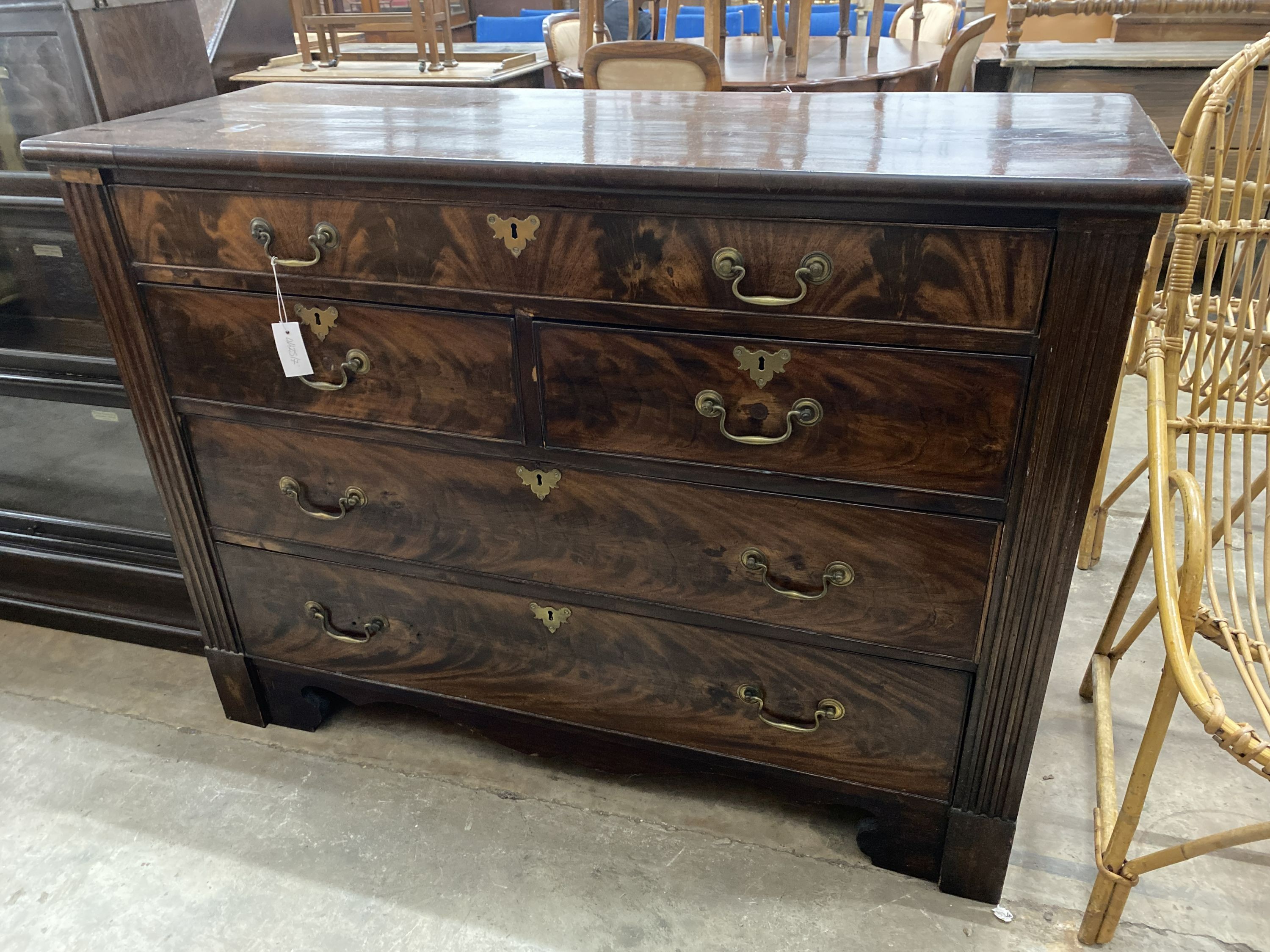 A George III mahogany chest of drawers, width 127cm, depth 49cm, height 94cm